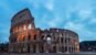 The Colosseum in Rome illuminated in soft early morning light with no crowds