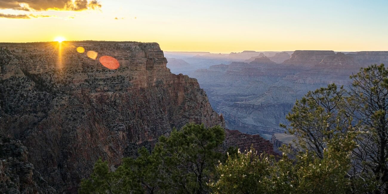Layered cliffs of the Grand Canyon glowing in warm evening light in Arizona