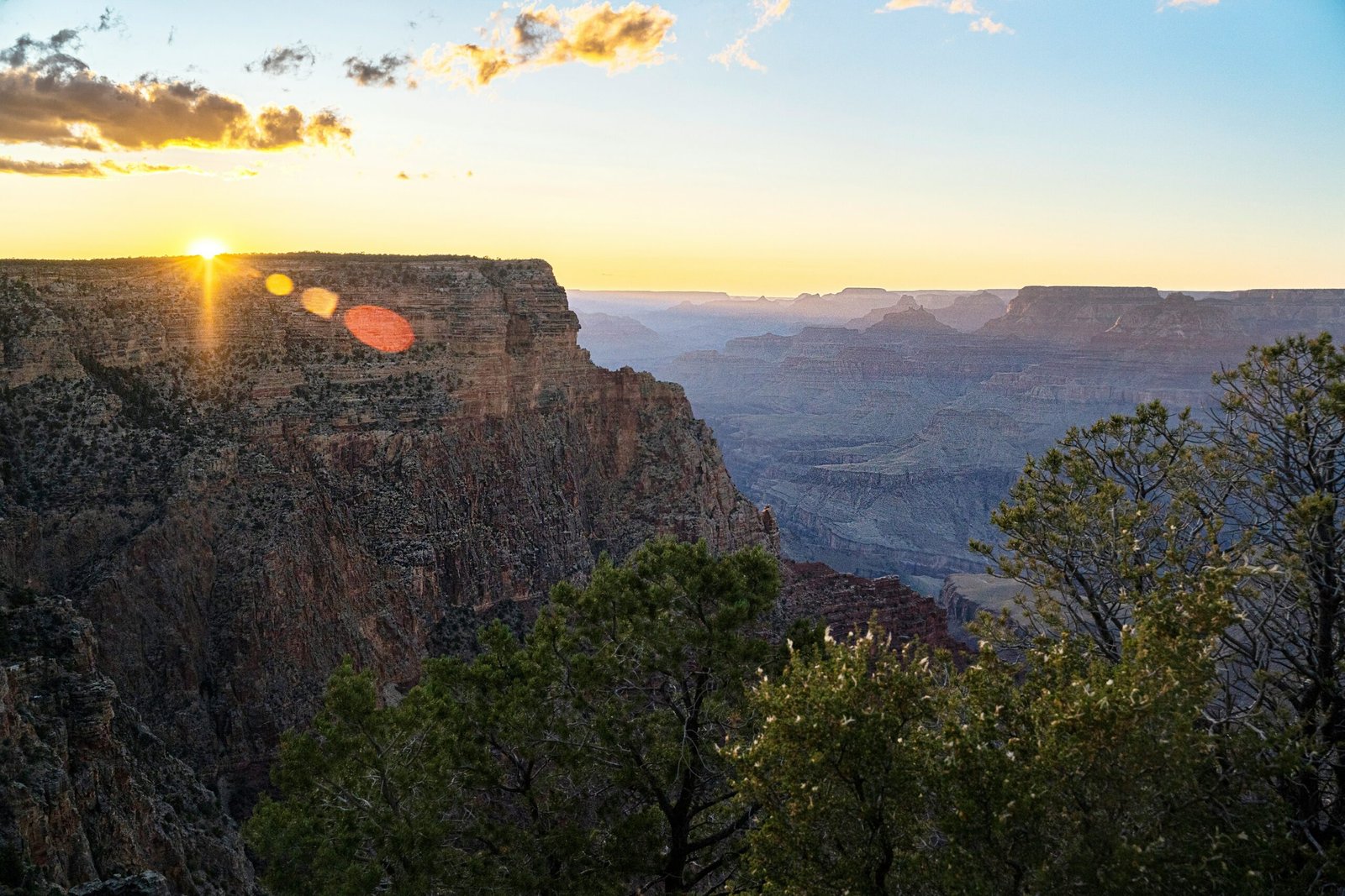 Layered cliffs of the Grand Canyon glowing in warm evening light in Arizona