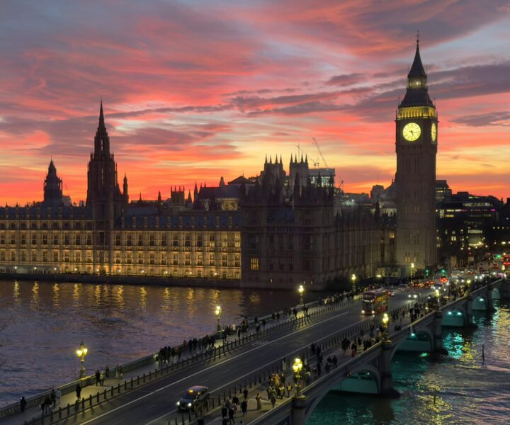 Westminster and Big Ben beside the River Thames at sunset in London