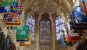 Gothic interior of Westminster Abbey in London with vaulted ceiling and historic flags